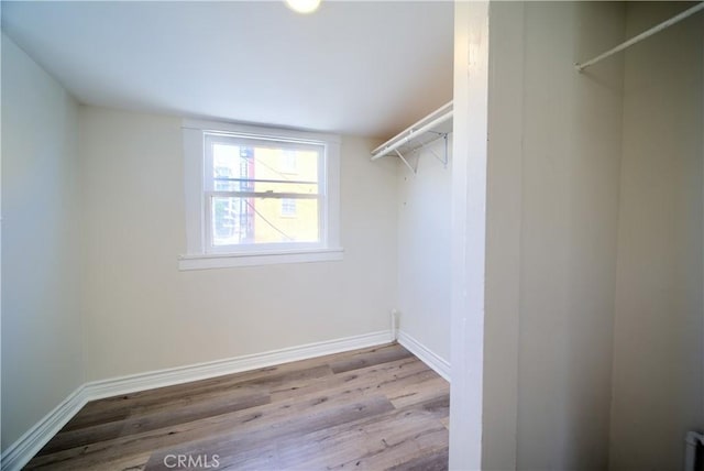 624 Cedar Ave, Long Beach, CA 90802 - walk in closet with wood finished floors