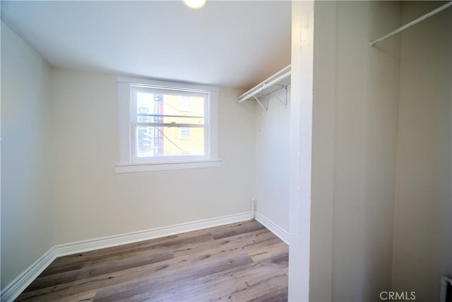 624 Cedar Ave, Long Beach, CA 90802 - walk in closet featuring wood finished floors