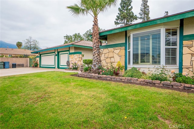 2136 Forbes Ave, Claremont, CA 91711 - single story home featuring a garage, fence, a front lawn, concrete driveway, and stucco siding