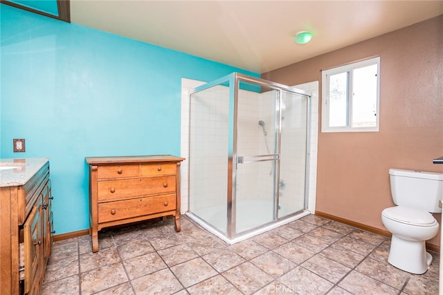 2136 Forbes Ave, Claremont, CA 91711 - bathroom with vanity, baseboards, toilet, and a shower stall