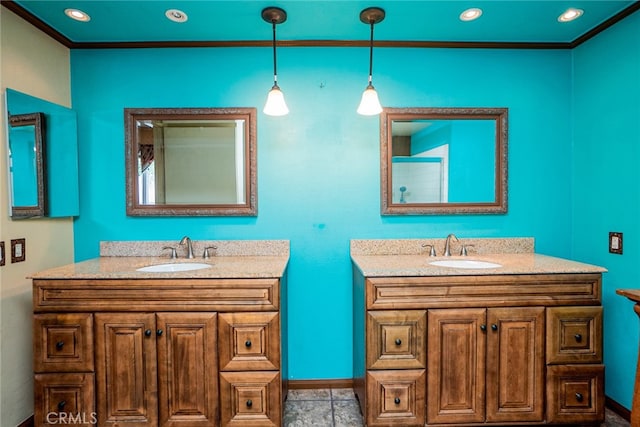 2136 Forbes Ave, Claremont, CA 91711 - bathroom with a sink, baseboards, and two vanities