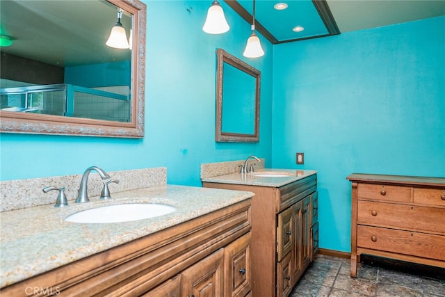 2136 Forbes Ave, Claremont, CA 91711 - full bath featuring a sink, stone finish flooring, two vanities, and a stall shower