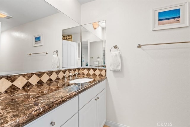 24242 Santa Clara Ave Unit 26, Dana Point, CA 92629 - bathroom with vanity and tasteful backsplash