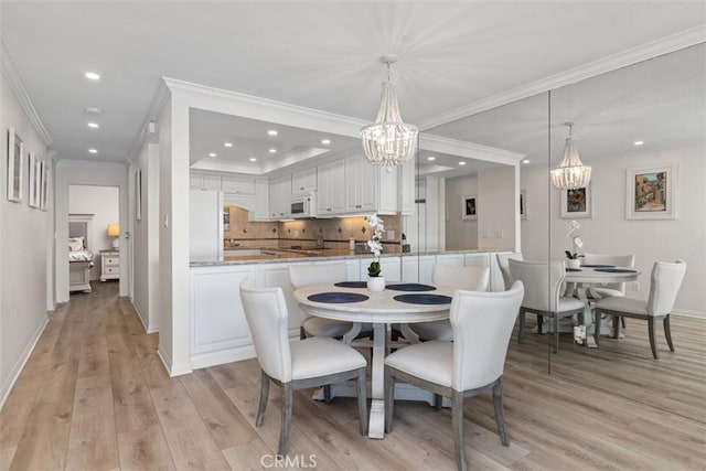 24242 Santa Clara Ave Unit 26, Dana Point, CA 92629 - dining area featuring recessed lighting, crown molding, and a notable chandelier