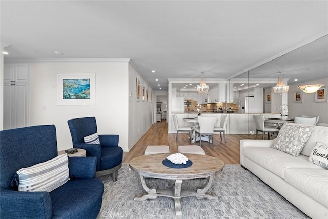 24242 Santa Clara Ave Unit 26, Dana Point, CA 92629 - living area featuring recessed lighting, light wood finished floors, crown molding, and a chandelier