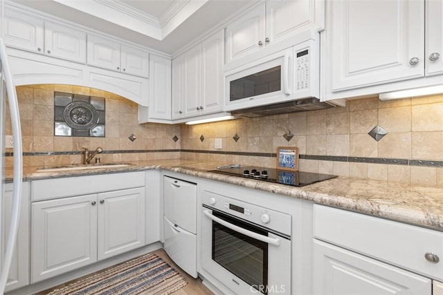 24242 Santa Clara Ave Unit 26, Dana Point, CA 92629 - kitchen featuring white appliances, crown molding, a sink, and white cabinets