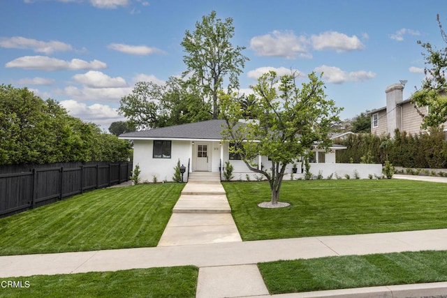 313 N Sunnyside Ave, Sierra Madre, CA 91024 - view of front of house with stucco siding, fence, and a front yard