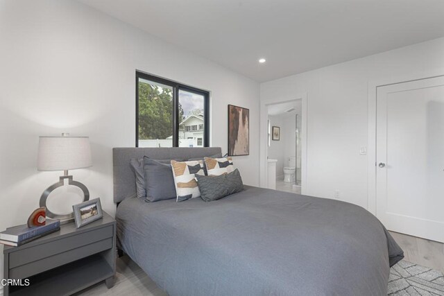 313 N Sunnyside Ave, Sierra Madre, CA 91024 - bedroom with recessed lighting, light wood-style flooring, and connected bathroom