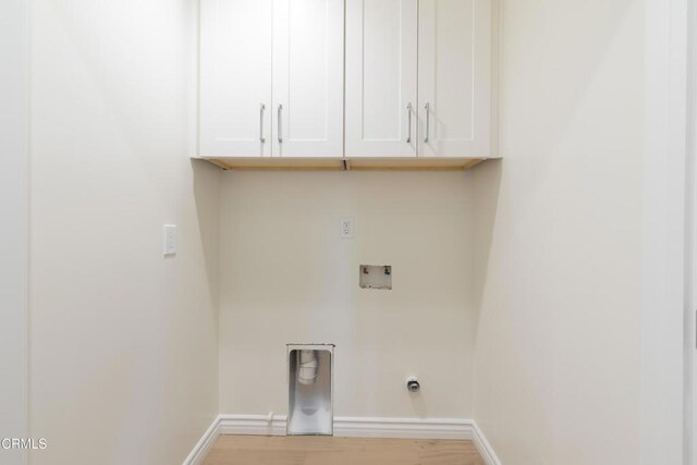 313 N Sunnyside Ave, Sierra Madre, CA 91024 - laundry area featuring baseboards, hookup for a washing machine, cabinet space, electric dryer hookup, and light wood finished floors