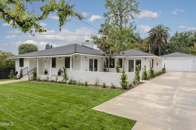 313 N Sunnyside Ave, Sierra Madre, CA 91024 - view of front facade featuring a front lawn, fence, driveway, a porch, and an outbuilding
