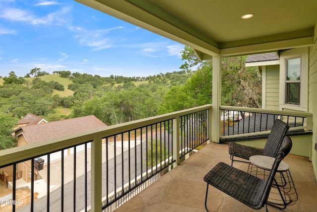 balcony with a wooded view