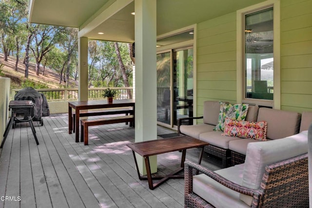 deck featuring an outdoor living space