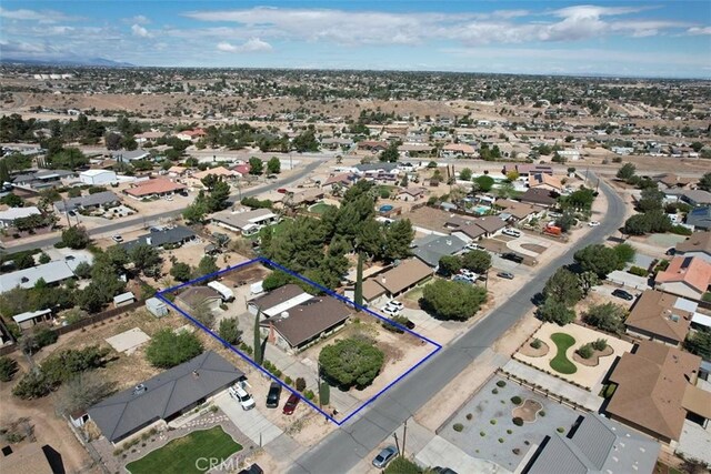 7486 Earhart Ave, Hesperia, CA 92345 - aerial view of residential area with property parcel outlined