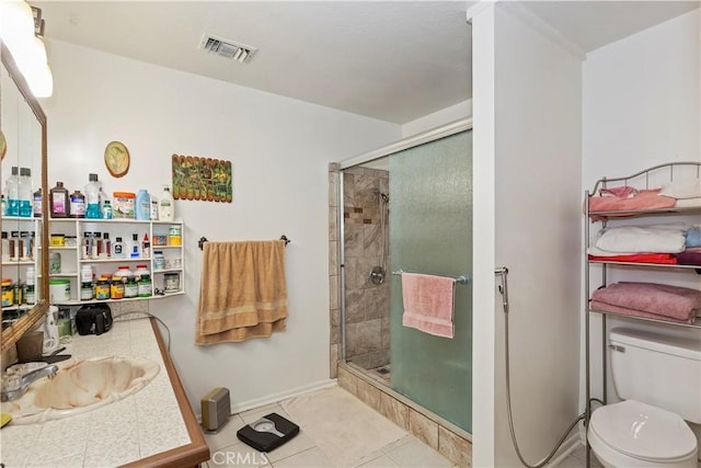 7486 Earhart Ave, Hesperia, CA 92345 - full bath featuring a sink, a shower stall, toilet, tile patterned floors, and baseboards