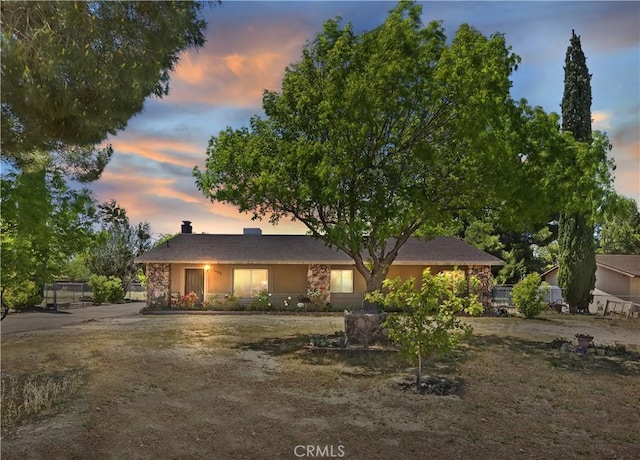 7486 Earhart Ave, Hesperia, CA 92345 - view of front of property with fence