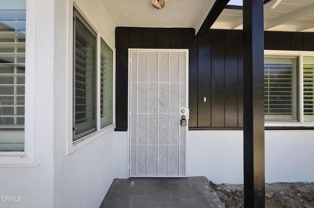 3911 S G St, Oxnard, CA 93033 - doorway to property with board and batten siding