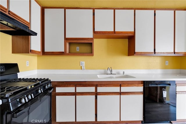 kitchen with under cabinet range hood, a sink, black appliances, and light countertops