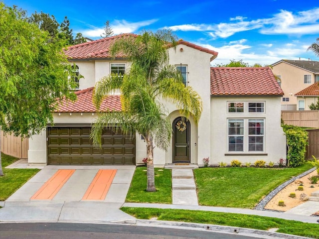 mediterranean / spanish house featuring concrete driveway, fence, a tile roof, and stucco siding