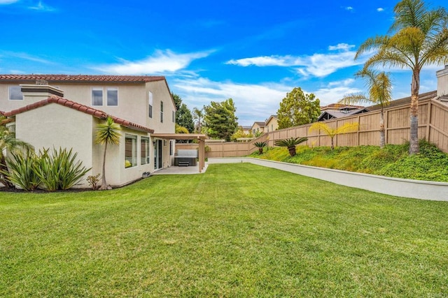 view of yard featuring a fenced backyard and a patio area