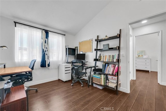 home office featuring baseboards, dark wood finished floors, and vaulted ceiling