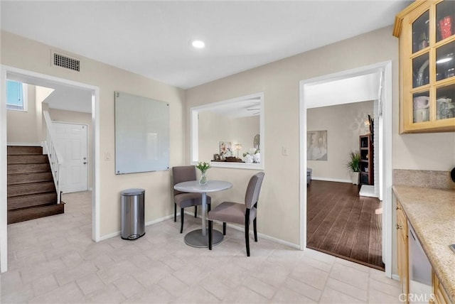 dining area featuring visible vents, recessed lighting, baseboards, and stairway