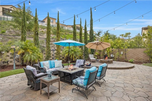 11 Cielo Arroyo, Mission Viejo, CA 92692 - fenced backyard featuring a patio and an outdoor living space with a fire pit