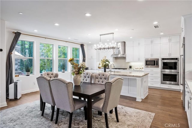 11 Cielo Arroyo, Mission Viejo, CA 92692 - dining space featuring wood finished floors and recessed lighting