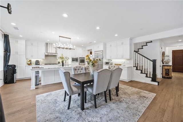 11 Cielo Arroyo, Mission Viejo, CA 92692 - dining space with stairway, light wood finished floors, and recessed lighting