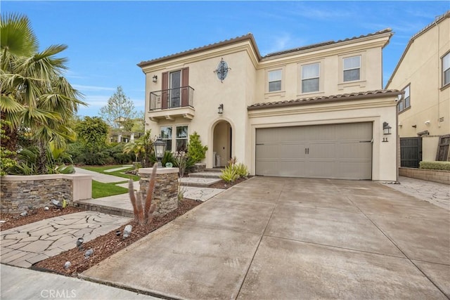 11 Cielo Arroyo, Mission Viejo, CA 92692 - mediterranean / spanish-style home with a balcony, stucco siding, concrete driveway, a garage, and a tiled roof