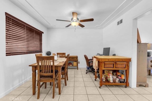 dining area featuring visible vents, baseboards, ceiling fan, and light tile patterned floors
