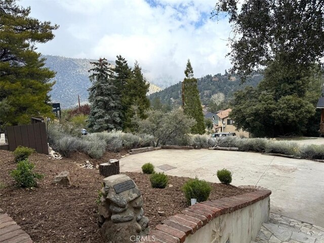 1909 Pioneer Way, Pine Mountain Club, CA 93222 - view of yard featuring a mountain view and a patio area