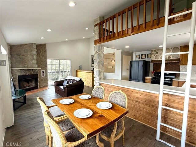 1909 Pioneer Way, Pine Mountain Club, CA 93222 - dining room with a fireplace, wood finished floors, and recessed lighting