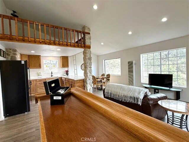 1909 Pioneer Way, Pine Mountain Club, CA 93222 - living area featuring wood finished floors, recessed lighting, and a heating unit
