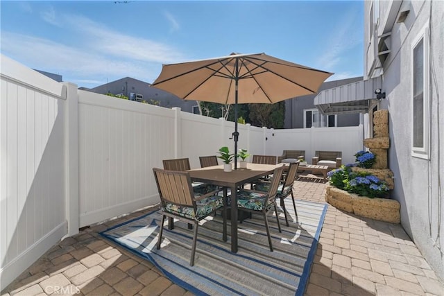1200 E Ocean Blvd Unit 59, Long Beach, CA 90802 - fenced backyard featuring outdoor dining area and a patio area