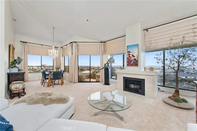 210 Lille Ln Unit 313, Newport Beach, CA 92663 - living room featuring an inviting chandelier, lofted ceiling, carpet, and a fireplace with flush hearth