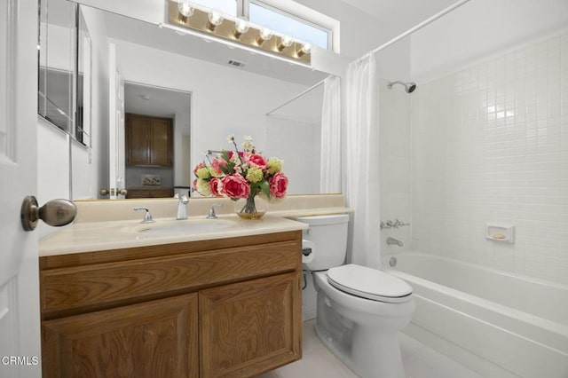 bathroom featuring tile patterned flooring, vanity, toilet, shower / bath combo with shower curtain, and visible vents