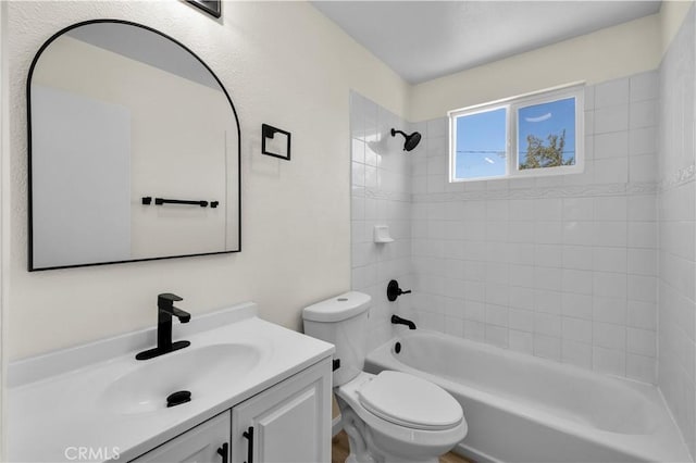 full bathroom with toilet, bathtub / shower combination, and vanity