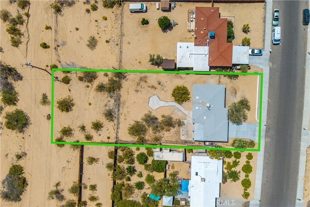 bird's eye view with a desert view