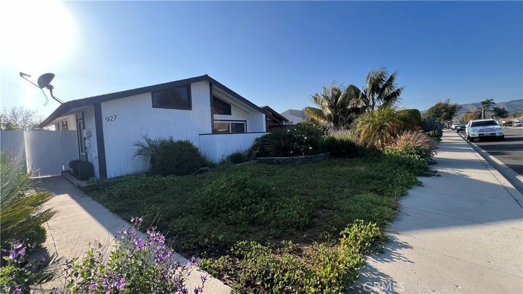 view of side of property with fence