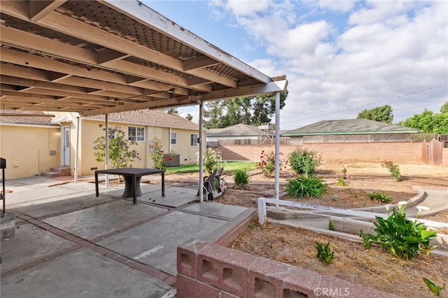 view of patio with fence