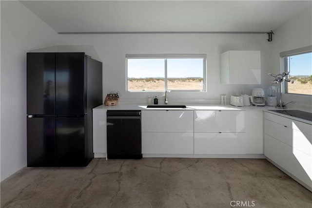 60810 Cole Ln, Landers, CA 92285 - kitchen with a sink, white cabinets, modern cabinets, and black appliances