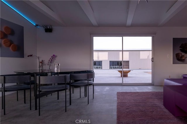 60810 Cole Ln, Landers, CA 92285 - dining room featuring concrete floors and beamed ceiling