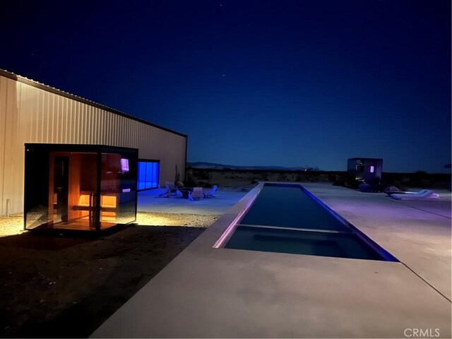 60810 Cole Ln, Landers, CA 92285 - view of pool at twilight