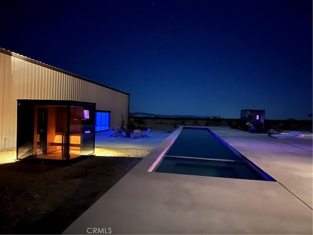 60810 Cole Ln, Landers, CA 92285 - view of pool at twilight