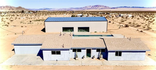 60810 Cole Ln, Landers, CA 92285 - aerial view of property and surrounding area featuring a mountainous background