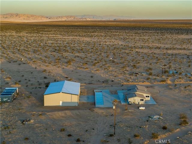 60810 Cole Ln, Landers, CA 92285 - aerial view at dusk of view of desert landscape, a mountain view, and a view of countryside