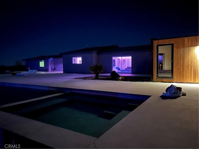60810 Cole Ln, Landers, CA 92285 - pool at twilight featuring an outdoor pool