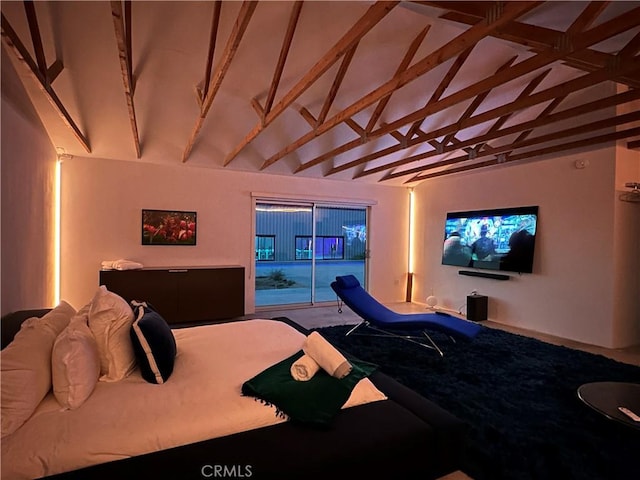 60810 Cole Ln, Landers, CA 92285 - bedroom with access to outside, beam ceiling, carpet floors, and high vaulted ceiling