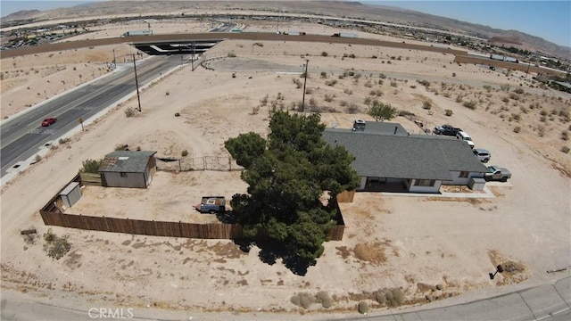 drone / aerial view featuring a mountain view