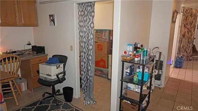 office area with light tile patterned floors